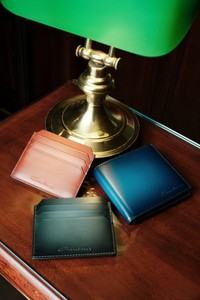 Green leather credit card holder - Santoni - editorial