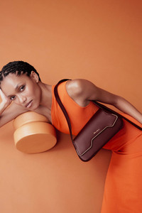 Burgundy leather ThePluto bag - Santoni - editorial