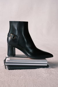 Women's black leather mid-heel ankle boot - Santoni - editorial